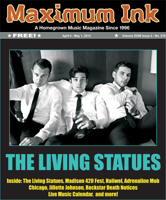 Living Statues on the cover of Maximum Ink for April 2014 - photo by Adrienne D. Williams