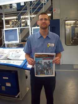Denny from Bliss Communications holds the first NEW issue of Maximum Ink to be printed on their fabulous new press