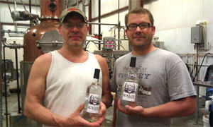 Rökker & Lars (Distiller at Yahara Bay) with the first bottles of Rökker Vodka off the line - photo by Nick Quint