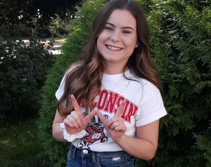 Lizzie on her way to her first UW Badger Football game, turns out it was the hottest on record! - photo by Rökker