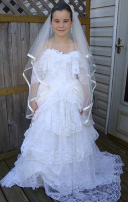 Elizabeth in her dress-up Wedding Dress - photo by Rökker