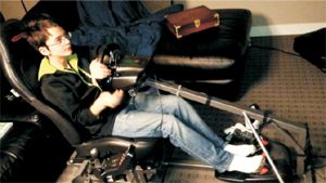 Nikko in Marko's custom Corvette seat gaming chair - photo by Mark Kroll