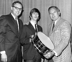 Bill Ludwig II presenting a snare drum to Ringo Star of the Beatles